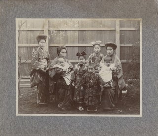 Item #16856 Photograph of Two Japanese Women with a Teenager and Five Children