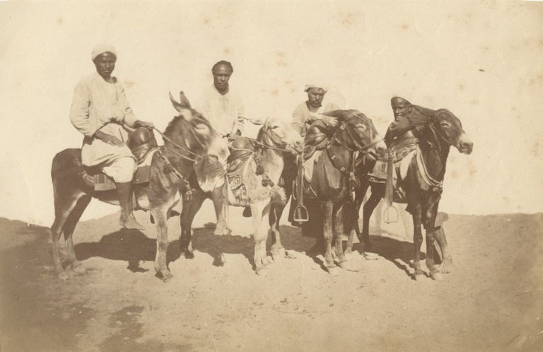 Item #16859 Photograph of Four Bedouins on Donkeys, Suez, 1870.