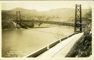 Item #18573 Advertising real photo postcard, the construction of the Bear Mountain Bridge. John...