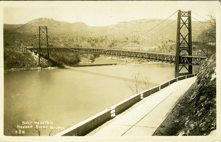 Item #18573 Advertising real photo postcard, the construction of the Bear Mountain Bridge. John Roebling, Haines Motor Service.