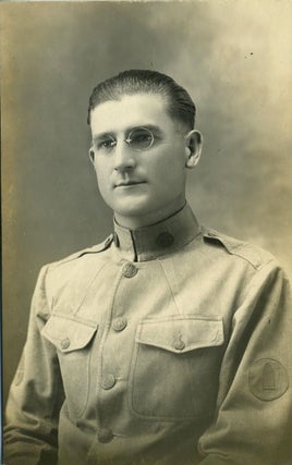 Item #19395 Studio portrait of a World War I soldier. Real photo postcard