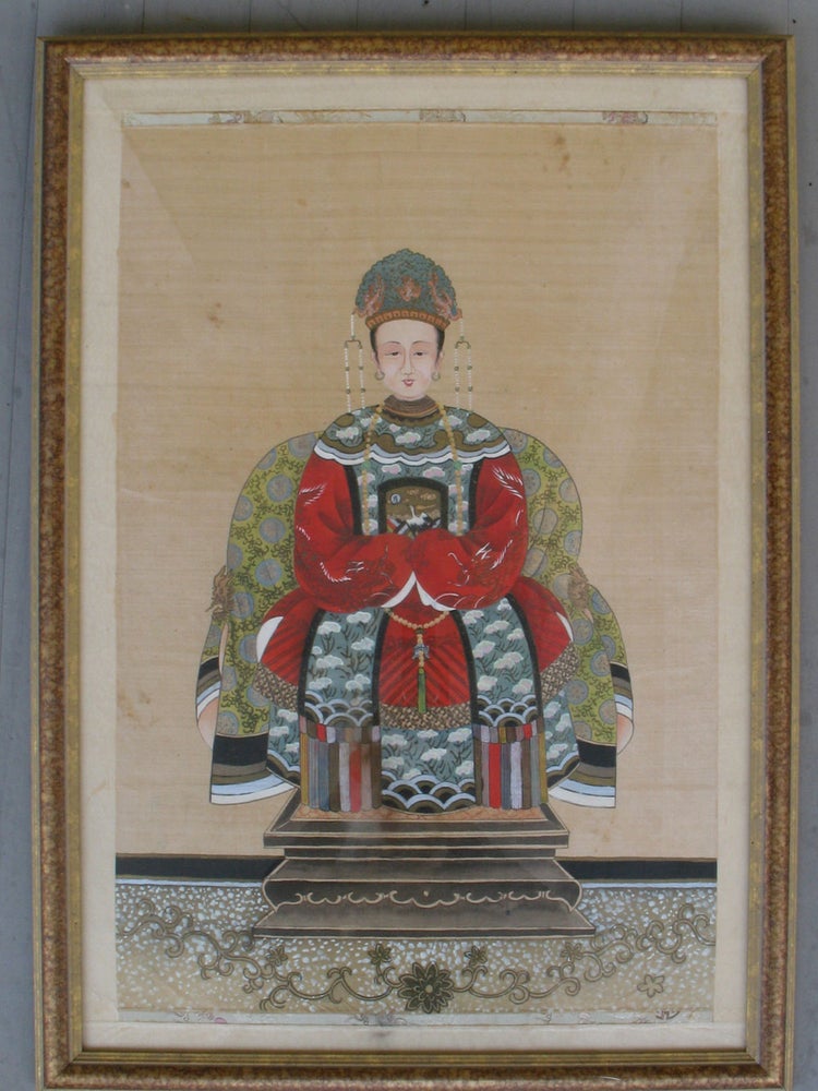 Item #21775 A Pair of Qing Dynasty Ancestor Portraits, the Court Official in deep blue robes, his wife in red.