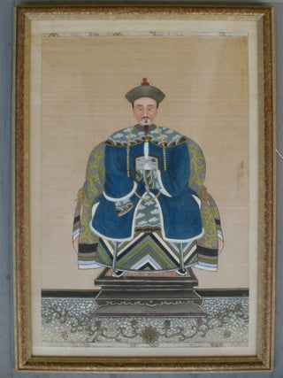 A Pair of Qing Dynasty Ancestor Portraits, the Court Official in deep blue robes, his wife in red.