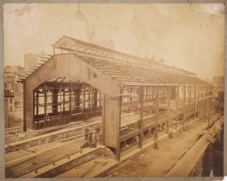 "Work in Progress on the Brooklyn Pier of the East River Bridge, W. A. Roebling Eng'r". Albumen photograph [with] 3 Bridge Terminal albumen images.