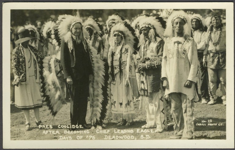 Item #24949 "Pres. Coolidge After Becoming Chief Leading Eagle, Days of '76, Deadwood, S.D." Real picture postcard.