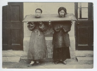 Item #25701 Chinese couple incarcerated together, photograph